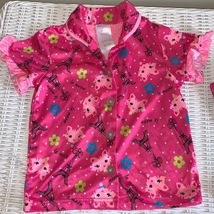 100% polyester pink graphic pajama set.